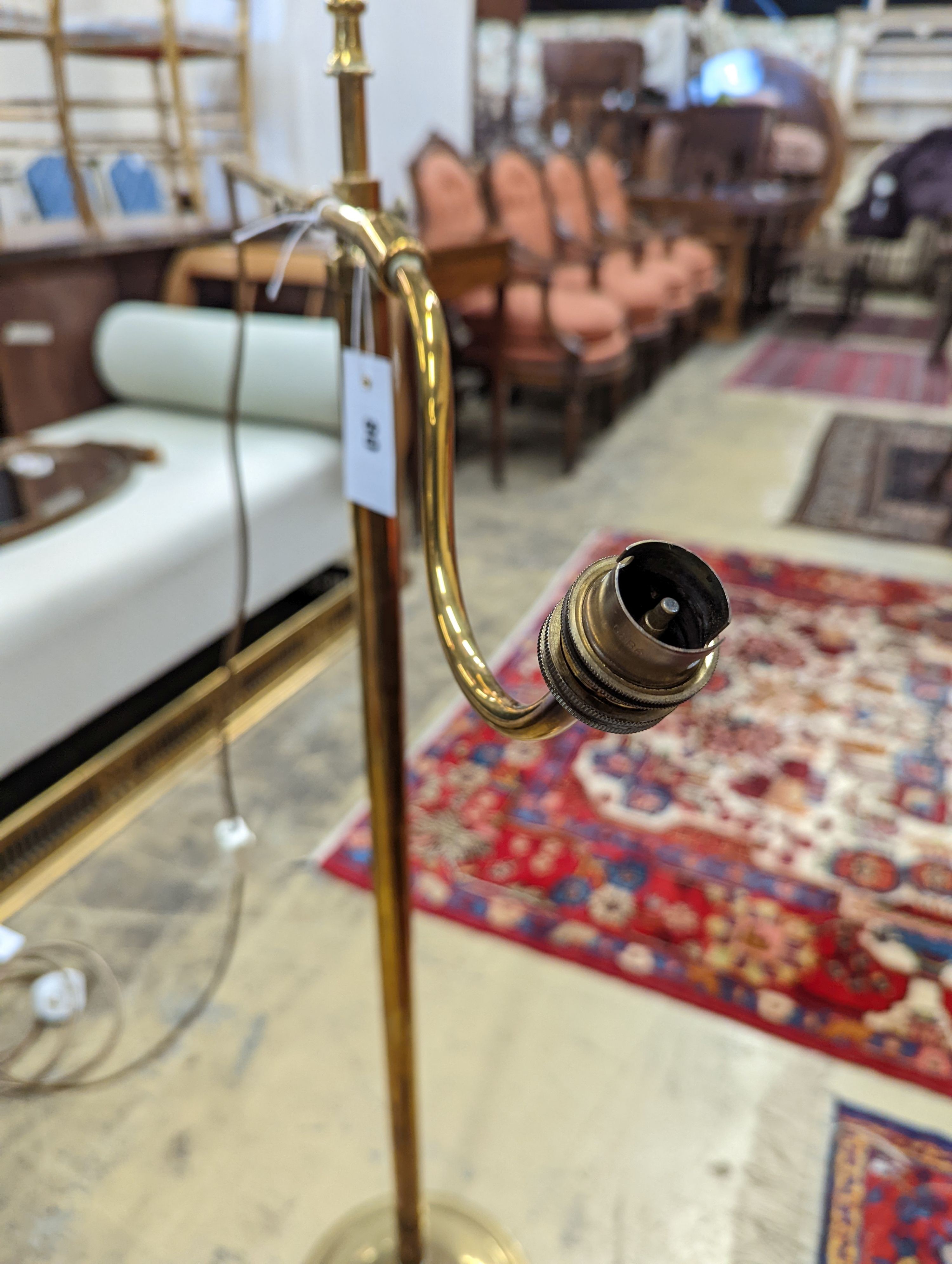 An Edwardian brass telescopic floor lamp converted to electricity